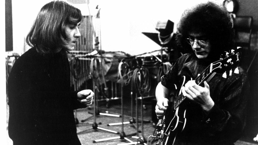 1969: (L-R) Lyricist Peter Sinfield and guitarist Robert Fripp of the first lineup of the English rock band "King Crimson" record in the studio in 1969. (Photo by Michael Ochs Archives/Getty Images)