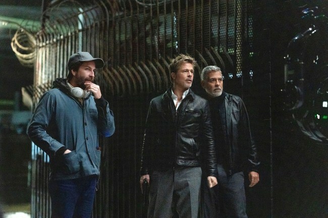 Jon Watts, Brad Pitt, George Clooney, on set of 'Wolfs'