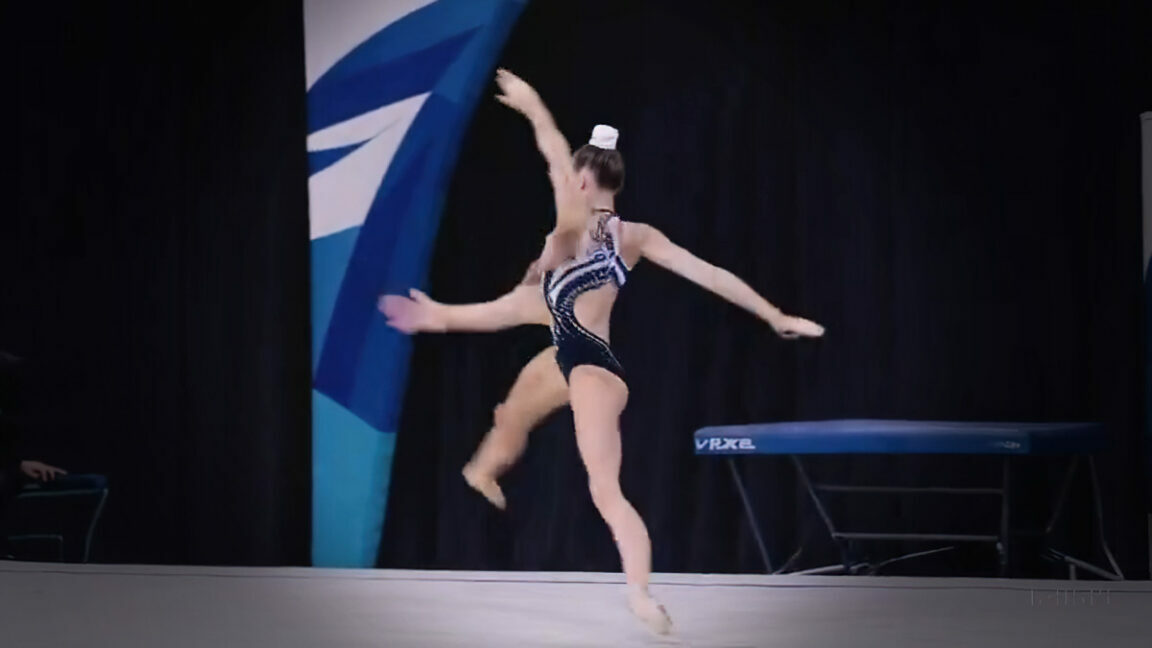 A still image from an AI-generated video of an ever-morphing synthetic gymnast.