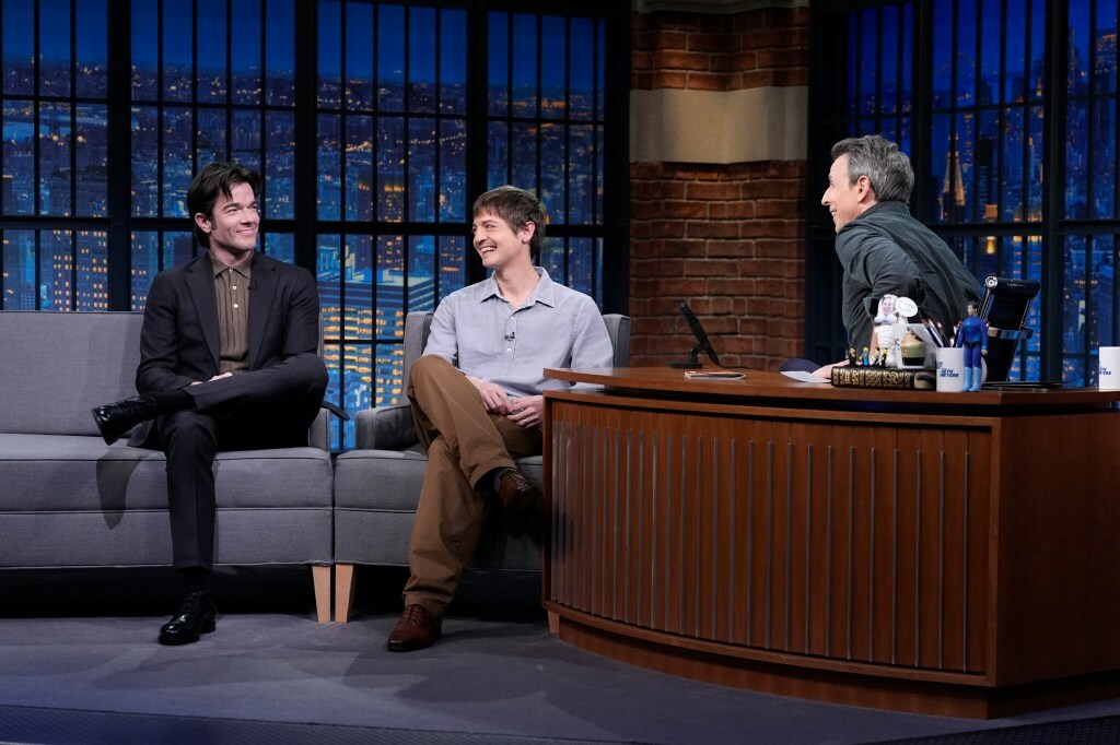 Pictured: (l-r) Comedian John Mulaney, writer Simon Rich during an interview with host Seth Meyers