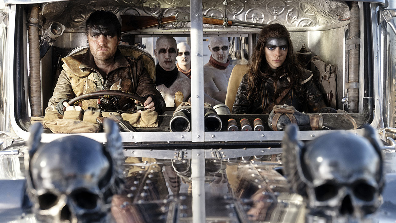Tom Burke as Praetorian Jack and Anya Taylor Joy as Furiosa in FURIOSA A MAD MAX SAGA