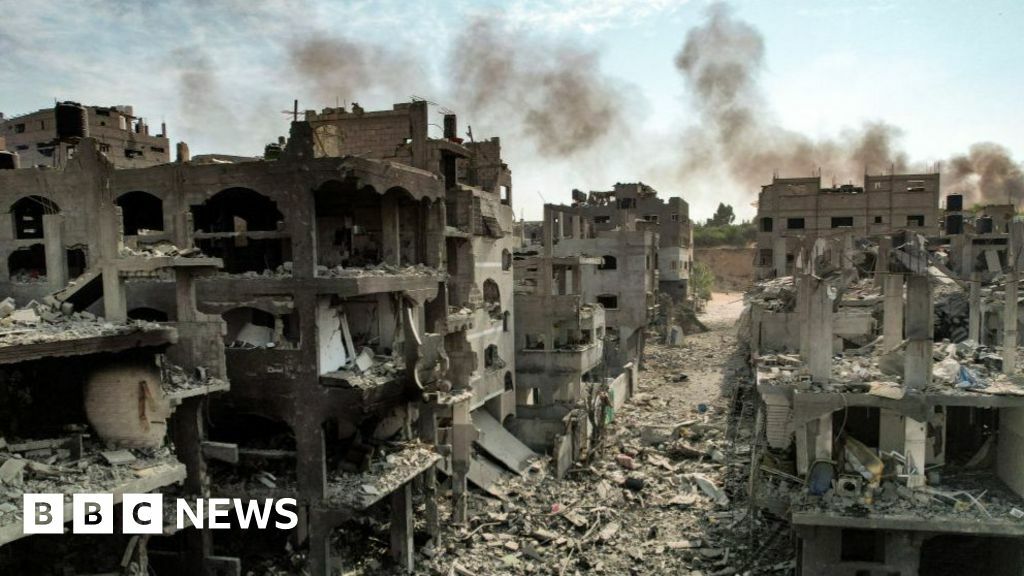 Aerial view of buildings destroyed by Israeli air strikes in Jabalia camp for Palestinian refugees in Gaza City This picture taken on 11 October 2023