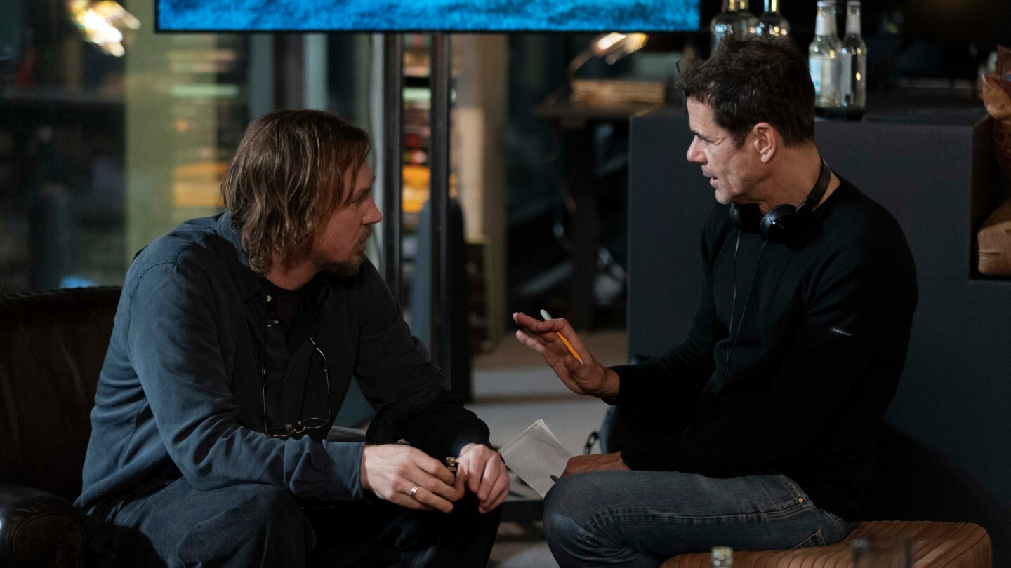 Tom Tykwer (right) with actor Lars Eidinger on the set of 'The Light'