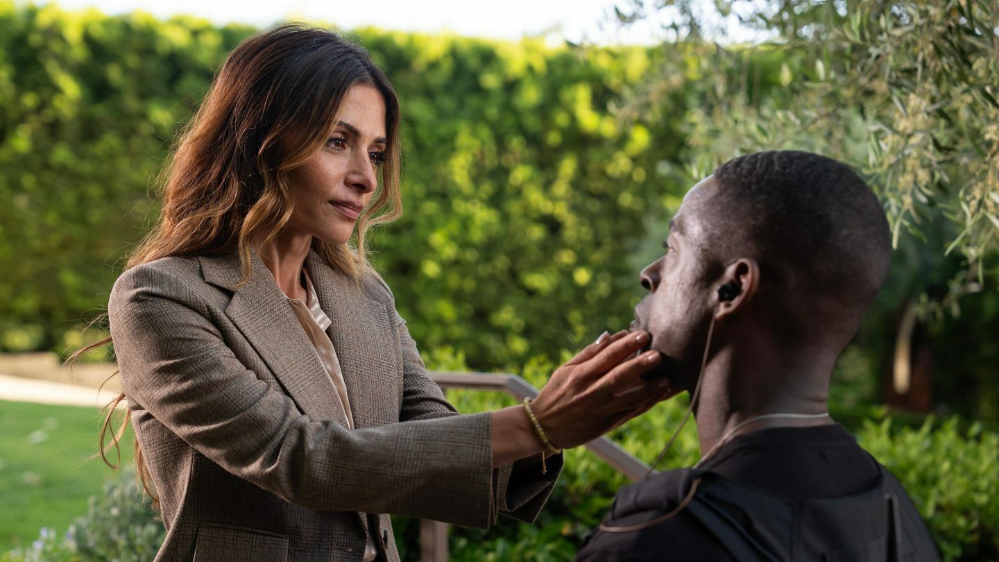 Dr. Gabriela Torabi (Sarah Shahi) with Agent Xavier Collins (Sterling K. Brown).