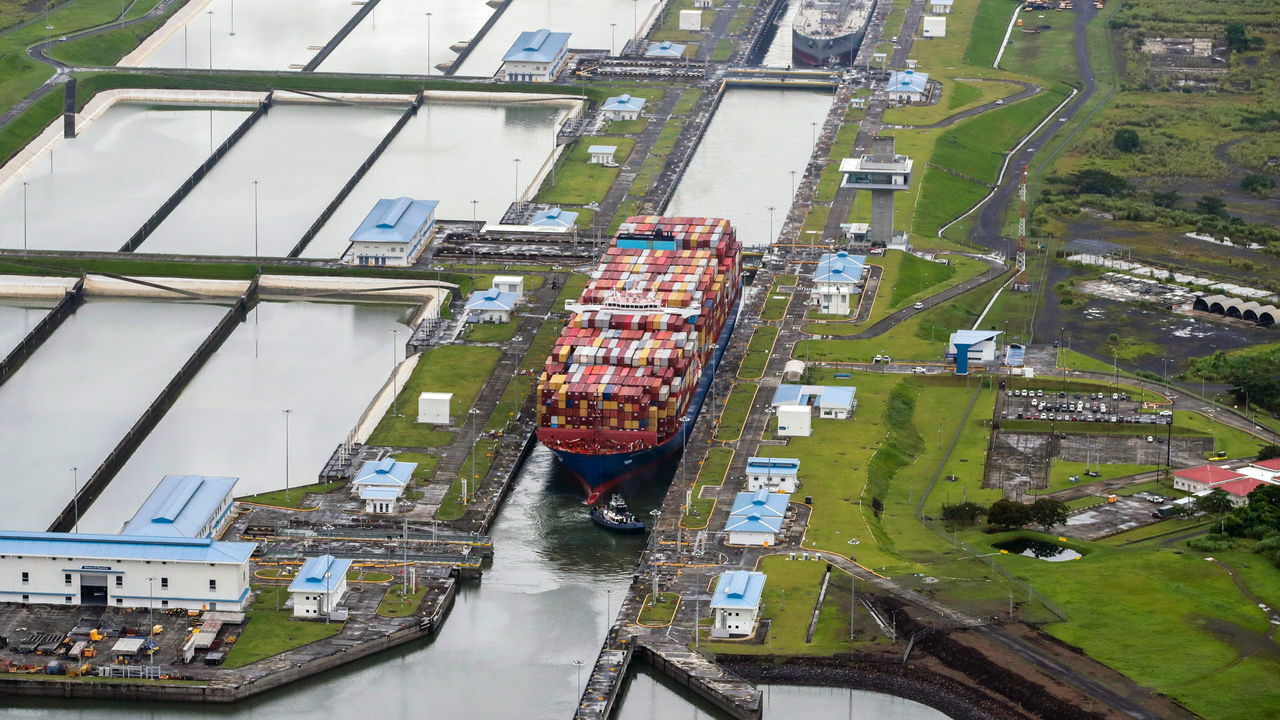 A container ship transits through the Cocoli locks in the Panama Canal in Panama.