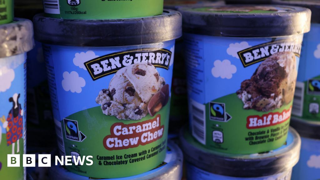 Tubs of Ben & Jerry's ice cream in a store freezer in London, UK.