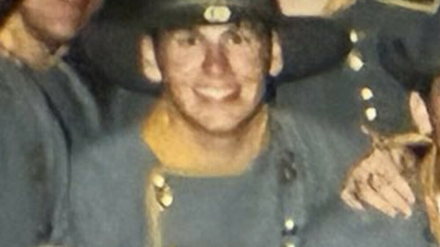 This detail from a photograph obtained by The Associated Press shows Jefferson Griffin among dozens of other Kappa Alpha fraternity members wearing Confederate military uniforms in the early 2000s, when Griffin was a student at the University of North Carolina. (AP Photo)