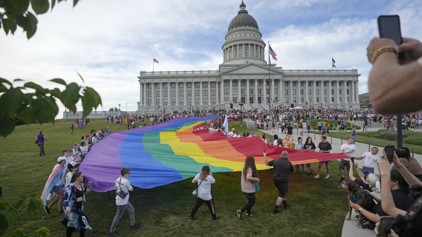 People march following a Pride rally at the Utah State Capitol Friday, June 2, 2023, in Salt Lake City. (AP Photo/Rick Bowmer, File)