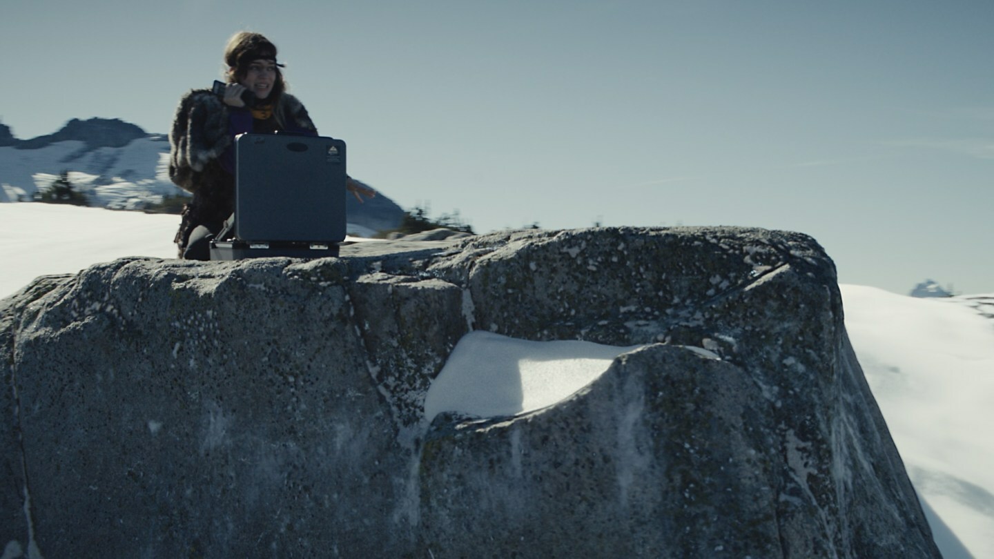 Sophie Thatcher in the finale's final scene, making contact with the outside world.