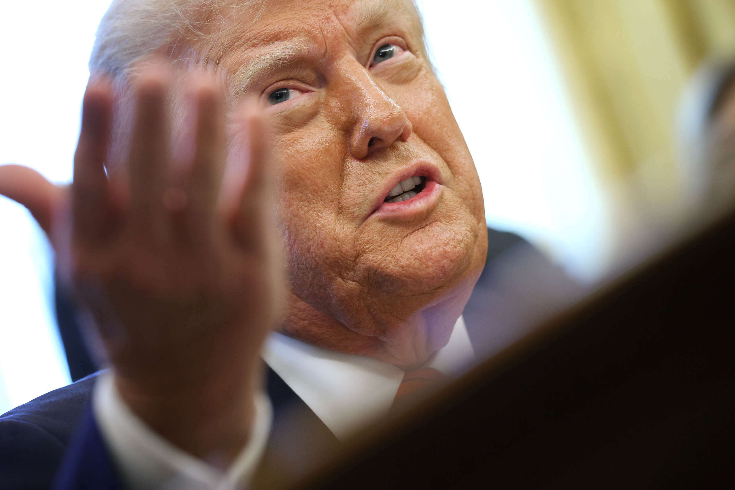 President Donald Trump speaks to reporters after signing a proclamation in the Oval Office at the White House on April 17, 2025, in Washington, D.C.