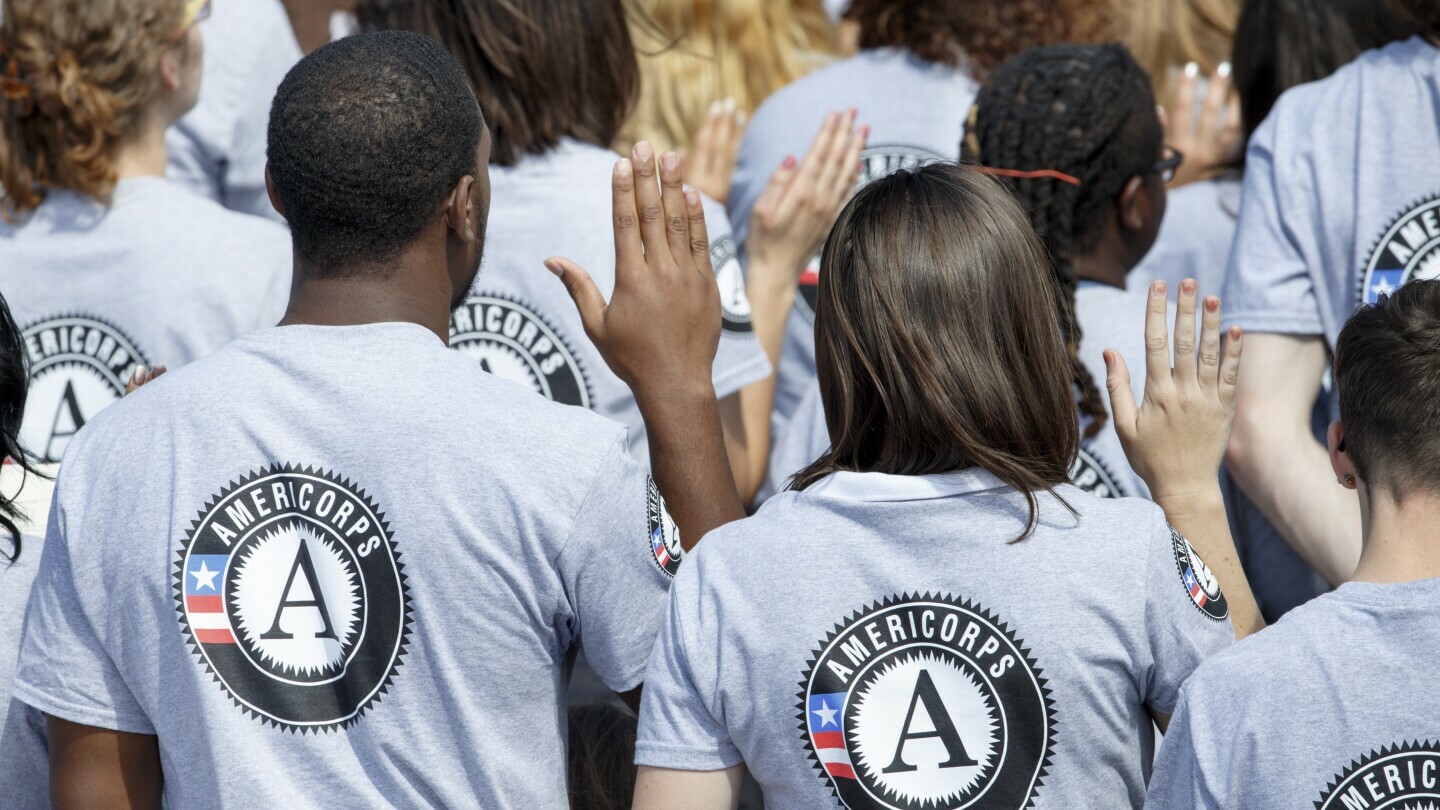 As President Barack Obama and former President Bill Clinton mark the 20th anniversary of the AmeriCorps national service program, hundreds of new volunteers are sworn in for duty at a ceremony, Friday, Sept. 12, 2014, on the South Lawn of the White House in Washington. (AP Photo/J. Scott Applewhite, file) As President Barack Obama and former President Bill Clinton mark the 20th anniversary of the AmeriCorps national service program, hundreds of new volunteers are sworn in for duty at a ceremony, Friday, Sept. 12, 2014, on the South Lawn of the White House in Washington. (AP Photo/J. Scott Applewhite, file)