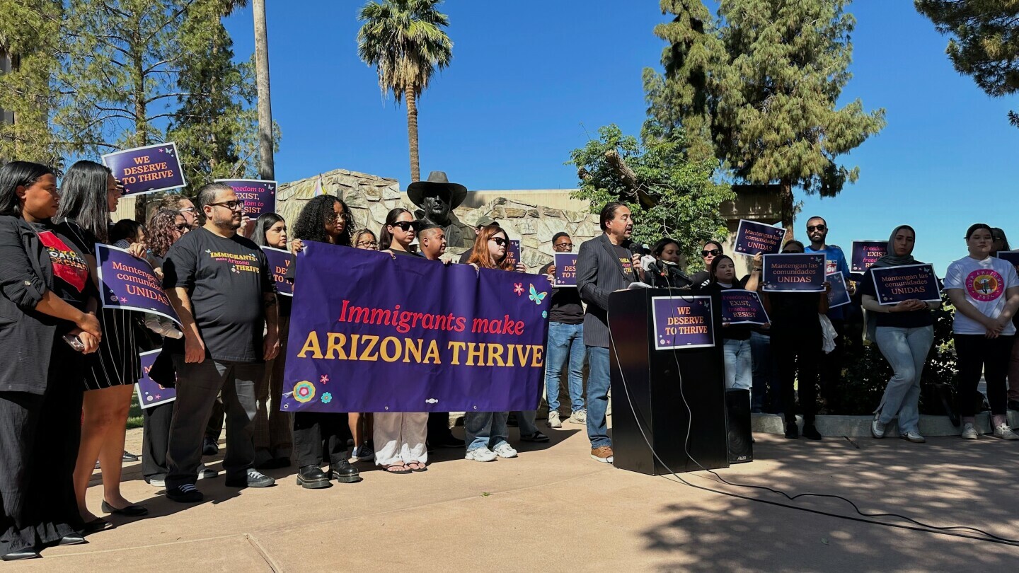 Martín Quezada, a former Democratic state lawmaker and the attorney for the Council on American-Islamic Relations of Arizona, speaks at a news conference alongside advocates for local immigrant rights organizations outside the statehouse in Phoenix on Friday, April 25, 2025. (AP Photo/Terry Tang)