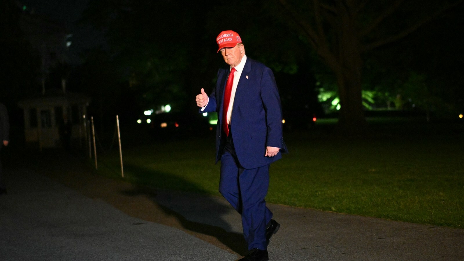 TOPSHOT - US President Donald Trump returns to the White House in Washington, DC, on April 29, 2025, after speaking at a rally in Michigan to mark his 100th day in office. (Photo by Mandel NGAN / AFP) (Photo by MANDEL NGAN/AFP via Getty Images)