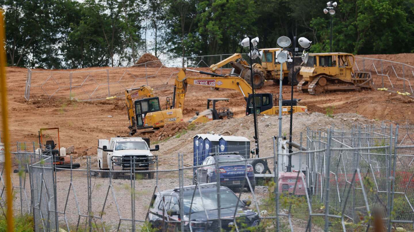 Bulldozers and heavy trucks are clearing the future site of the Atlanta Public Safety Training Center, May 30, 2023, in Atlanta. (Miguel Martinez/Atlanta Journal-Constitution via AP, File)