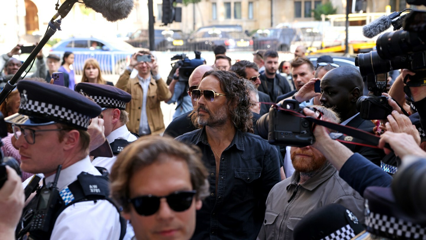 MAY 02: Russell Brand arrives at Westminster Magistrates' Court on May 02, 2025 in London, England. The charges relate to accusations of rape, indecent assault and sexual assault between 1999 and 2005. (Photo by Neil Mockford/Getty Images)