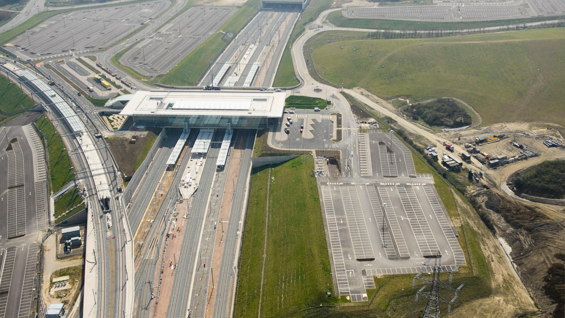Aerial view of Ebbsfleet International Station and its large car park. Aerial view of Ebbsfleet International Station and its large car park.