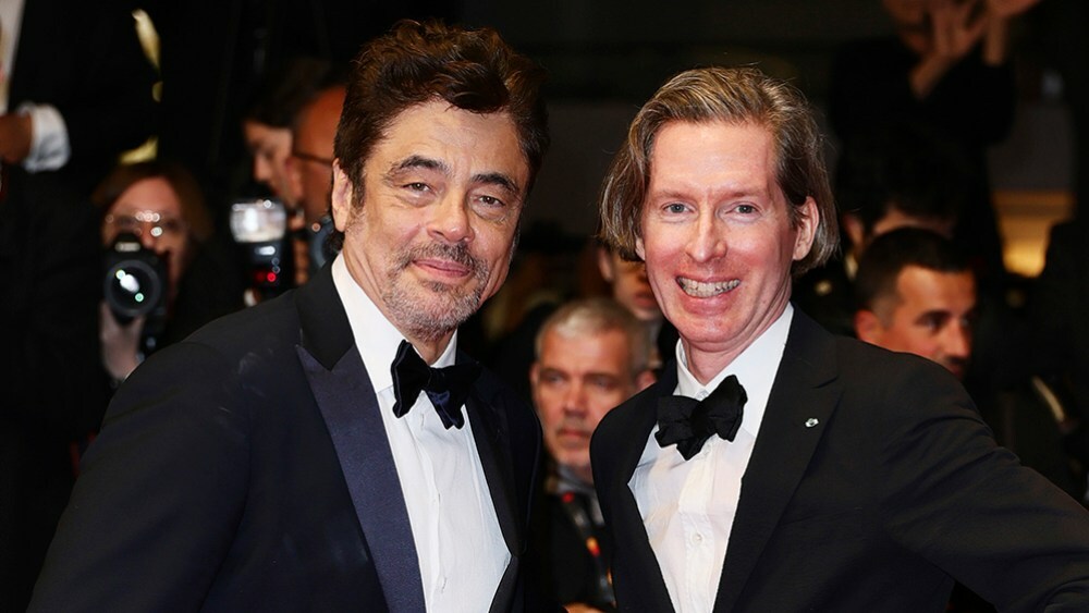 CANNES, FRANCE - MAY 18: Benicio del Toro and Wes Anderson  depart the "The Phoenician Scheme" red carpet at the 78th annual Cannes Film Festival at Palais des Festivals on May 18, 2025 in Cannes, France. (Photo by Andreas Rentz/Getty Images)