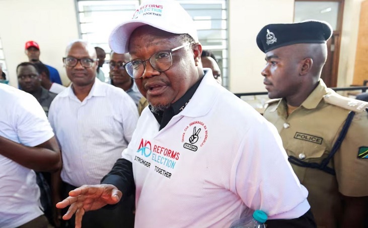 Tanzanian opposition leader and former presidential candidate of CHADEMA party Tundu Lissu is escorted as he walks at the Kisutu Resident Magistrate Court in Dar es Salaam, Tanzania...