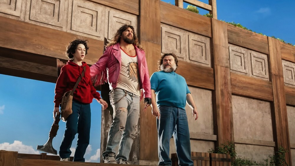 A MINECRAFT MOVIE, (aka MINECRAFT: THE MOVIE), from left: Sebastian Hansen, Jason Momoa, Jack Black, 2025. © Warner Bros. / Courtesy Everett Collection
