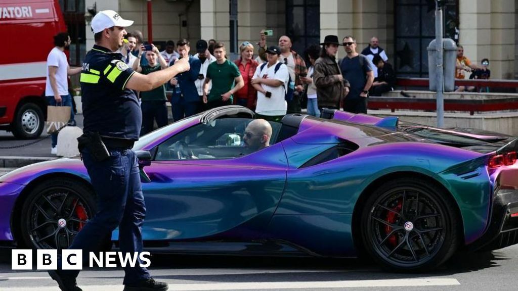 British-American influencer Andrew Tate drives a sports car in Bucharest, 27 April 27