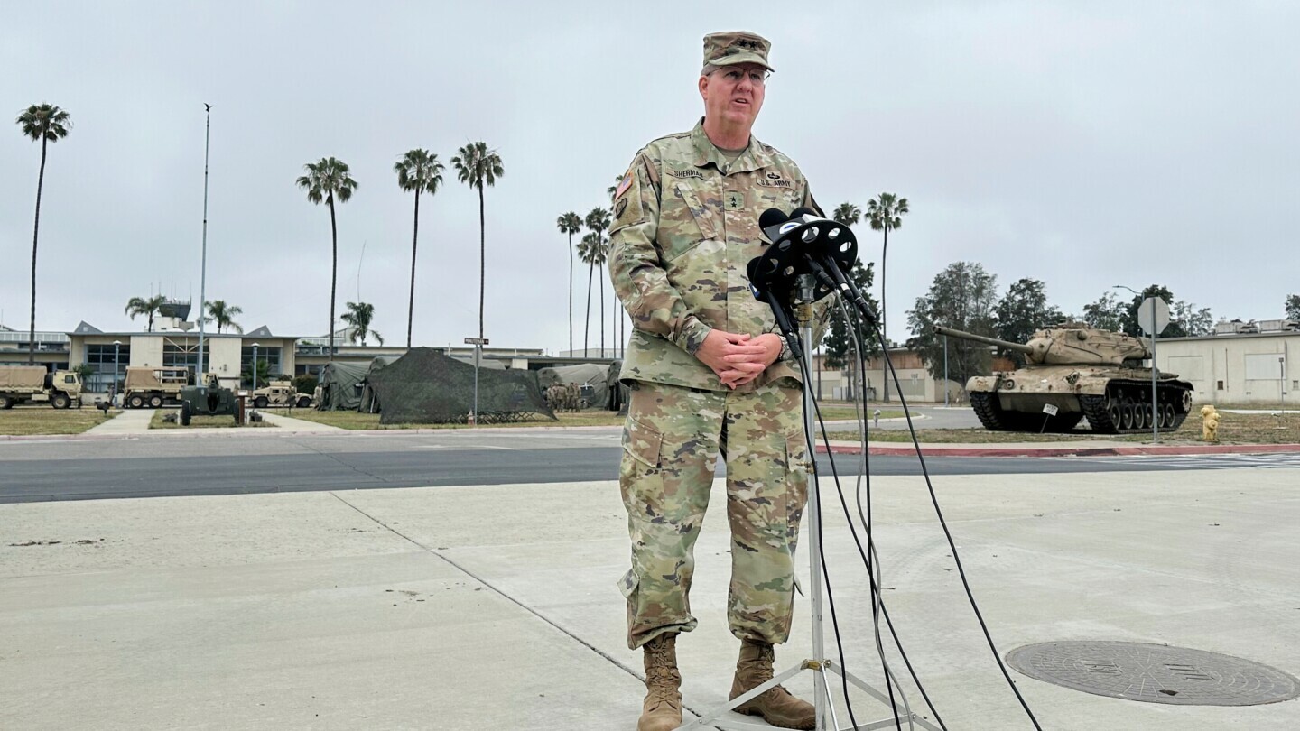 Maj. Gen. Scott Sherman, head of Task Force 51, which is overseeing the deployment of National Guard and Marines to Los Angeles, speaks to reporters Wednesday, June 11, 2025 at the Joint Forces Training Base in Los Alamitos, Calif. (AP Photo/Amy Taxin)