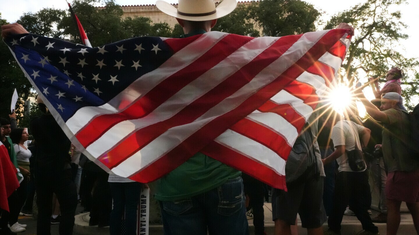 Anti-ICE protesters march in downtown San Antonio, Wednesday, June 11, 2025. (AP Photo/Eric Gay)