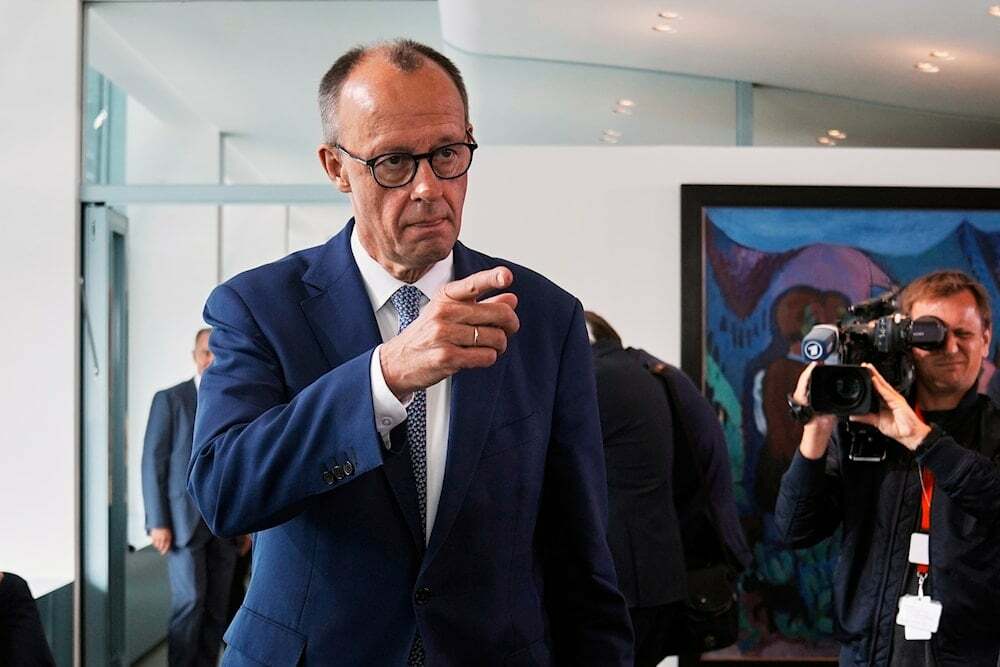German Chancellor Friedrich Merz arrives for the cabinet meeting at the chancellery in Berlin, Germany on June 11, 2025. (AP Photo/Markus Schreiber)