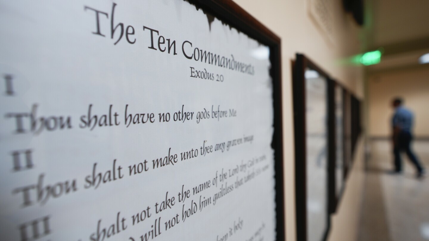A copy of the Ten Commandments is posted along with other historical documents in a hallway at the Georgia Capitol on June 20, 2024, in Atlanta. (AP Photo/John Bazemore, File)
