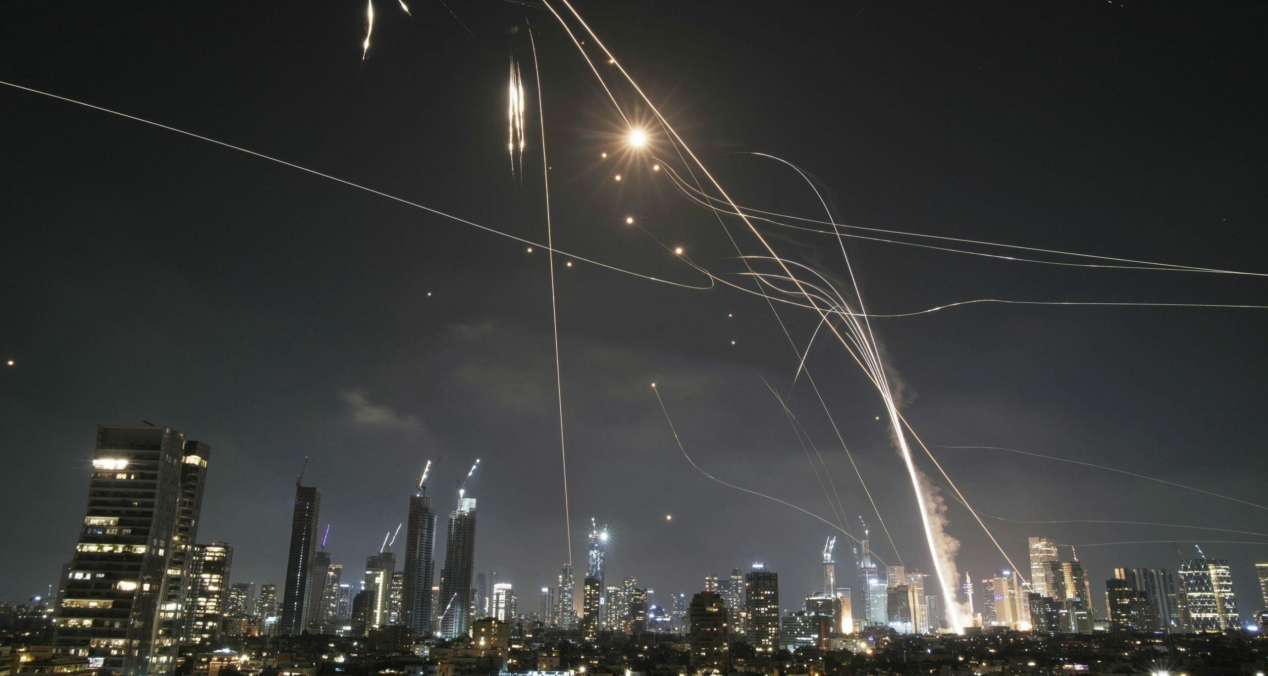 Israeli Iron Dome air defense system fires to intercept missiles over Tel Aviv, Israel, Friday, June 13, 2025. (AP Photo/Leo Correa)