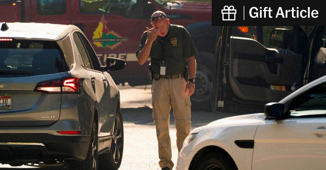 A law enforcement official near the area where two firefighters were killed Sunday on Canfield Mountain outside Coeur d’Alene, Idaho.