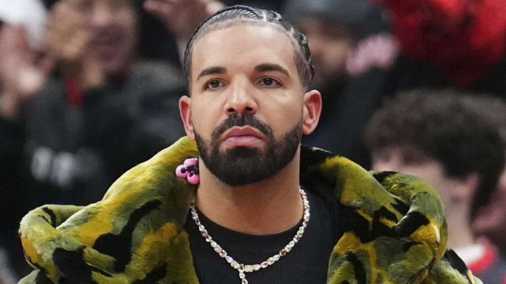 TORONTO, ON - NOVEMBER 2: Drake watches on as the Sacramento Kings play the Toronto Raptors during the second half of their basketball game at the Scotiabank Arena on November 2, 2024 in Toronto, Ontario, Canada. NOTE TO USER: User expressly acknowledges and agrees that, by downloading and/or using this Photograph, user is consenting to the terms and conditions of the Getty Images License Agreement. (Photo by Mark Blinch/Getty Images)