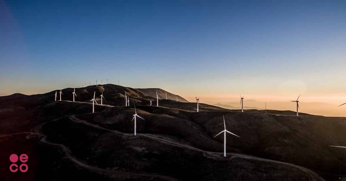 Many windmills on the top of low hills Many windmills on the top of low hills