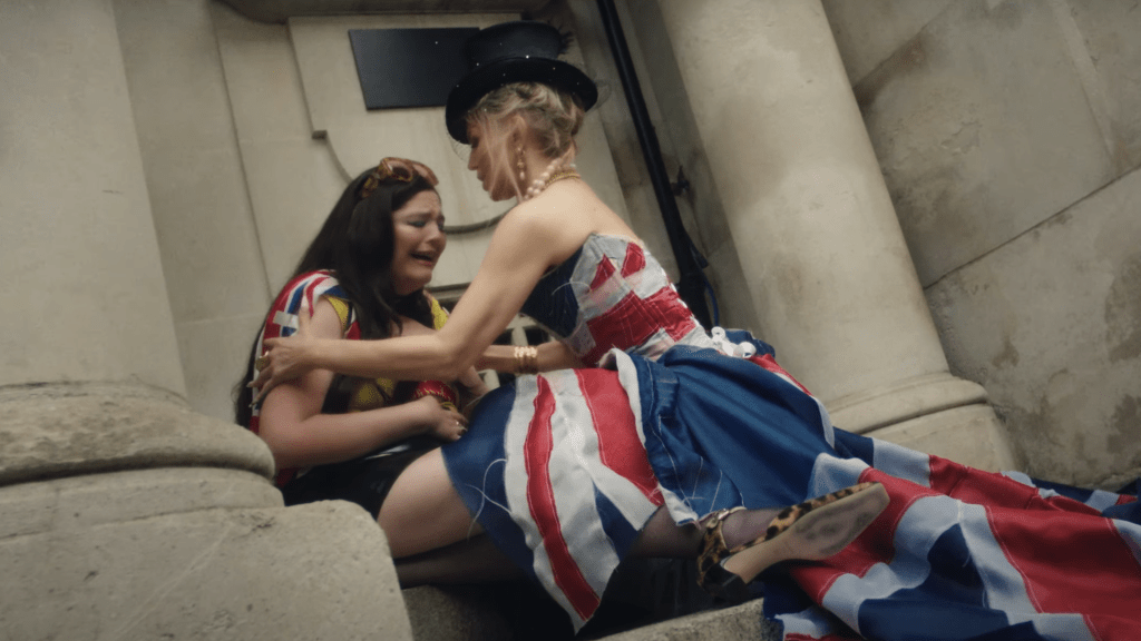 Meg Stalter and Fergie in Netflix's 'Too Much x London Bridge' music video Meg Stalter and Fergie in Netflix's 'Too Much x London Bridge' music video
