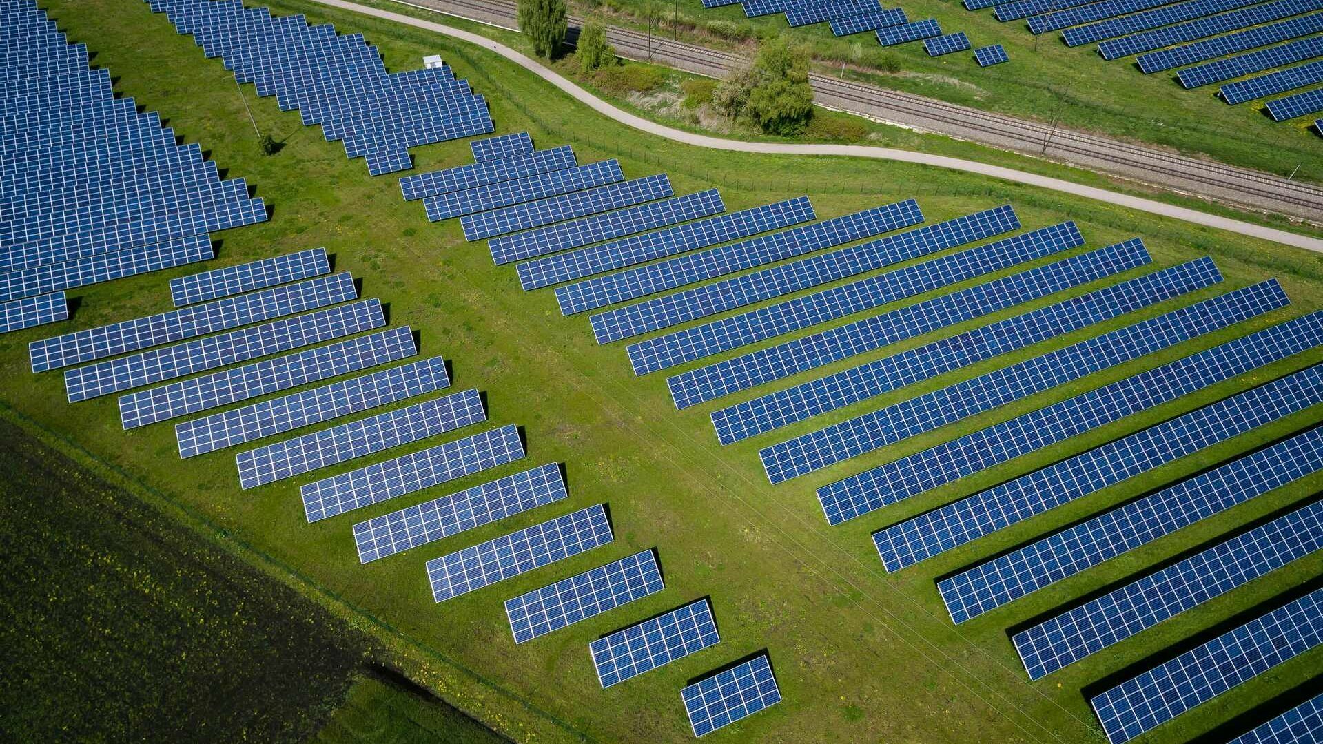 A field with solar panels in Offingen, Germany. | Copyright Andreas Gucklhorn/Unsplash