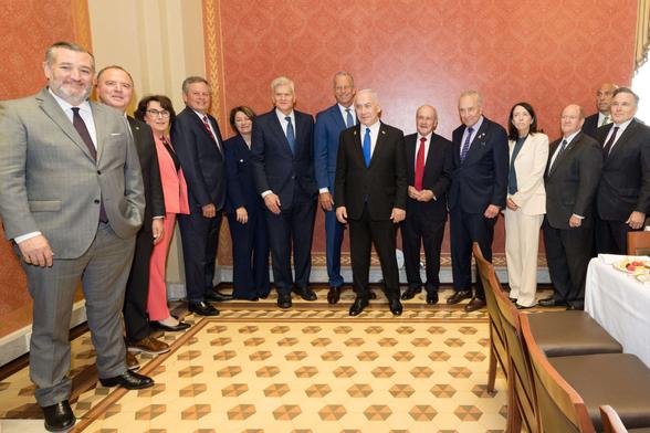 Senators take part in a photo op with Israeli Prime Minister Benjamin Netanyahu. Senators take part in a photo op with Israeli Prime Minister Benjamin Netanyahu.