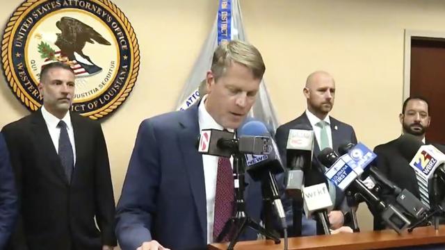 This image taken from a video provided by KATC shows U.S. Attorney Alexander C. Van Hook announcing charges against current and former police officers at a news conference in Lafayette, La., Wednesday, July 16, 2025. (KATC via AP)