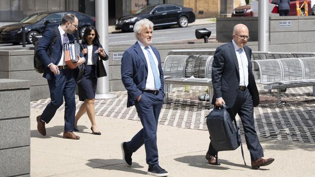 Former White House Chief of Staff Jeffrey Zients, center, arrives at the Court of Chancery on Wednesday, July 16, 2025, in Wilmington, Del. (AP Photo/Mingson Lau)
