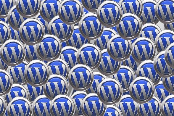 An image of the letter W in lots of blue badges.