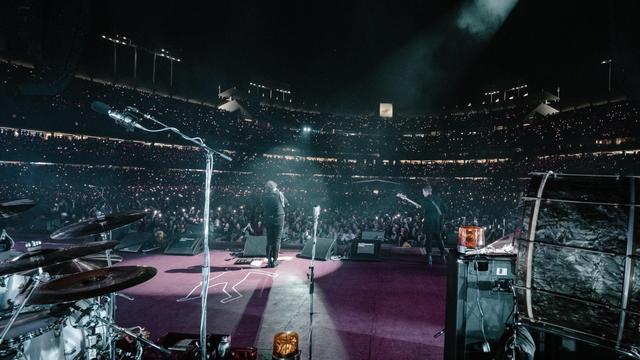 My Chemical Romance performing on stage.