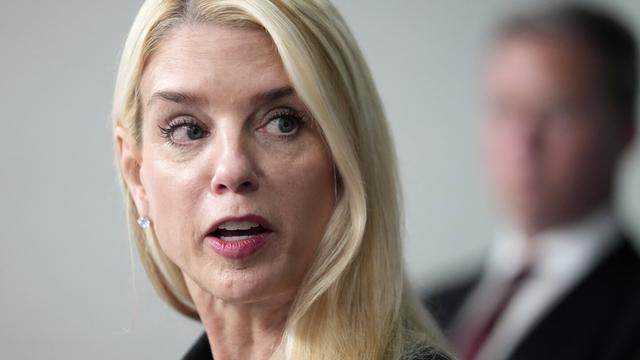 Attorney General Pam Bondi speaks with reporters during a briefing with President Donald Trump in the James Brady Press Briefing Room at the White House, Monday, Aug. 11, 2025, in Washington. (AP Photo/Mark Schiefelbein)