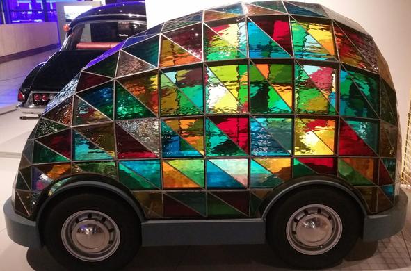Dominic Wilcox's concept driverless sleeper car, a small vehicle covered entirely with stained glass.