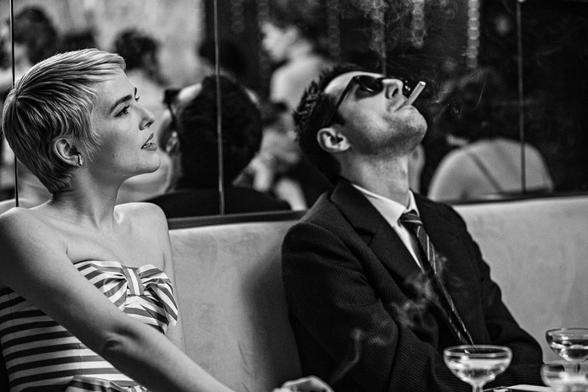 Zoey Deutch as Jean Seberg and Guillaume Marbeck as Jean-Luc Godard in the movie Nouvelle Vague.