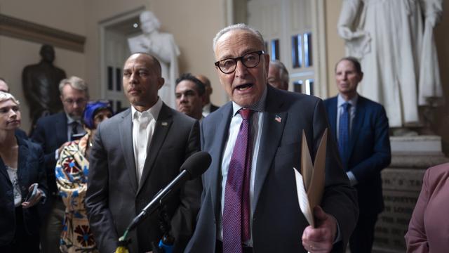 Senate Minority Leader Chuck Schumer, D-N.Y., joined at left by House Minority Leader Hakeem Jeffries, D-N.Y., speaks to reporters after meeting about Republican efforts to cut health care spending, at the Capitol in Washington, Thursday, Sept. 11, 2025. (AP Photo/J. Scott Applewhite)