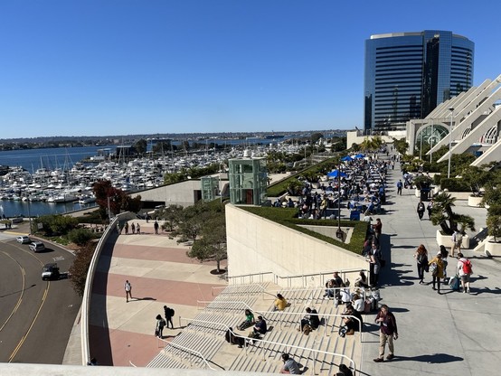 Blue sky, sea harbor, crowd