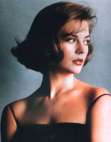 Closeup Natalie Wood portrait. She looks off to the right expectantly. Her hair is in a bob.