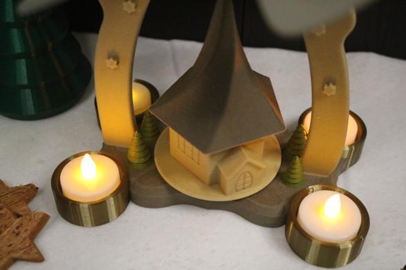 3D Printed closer look at Christmas Pyramid with LED tea lights. 