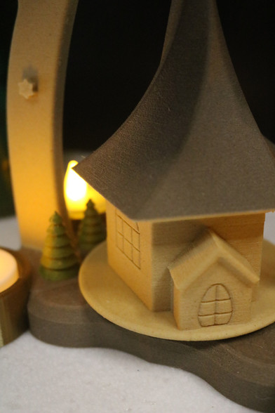 3D Printed closer look at Christmas Pyramid with LED tea lights. 