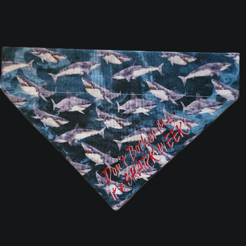 Our realistic great white shark bandana that says "Don't Bother Me, It's Shark Week!" Font in red