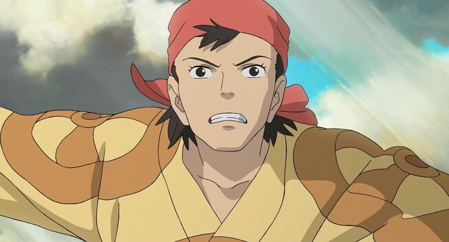 Kiriko, wearing red head cover from fabric and his face expression showing the effort