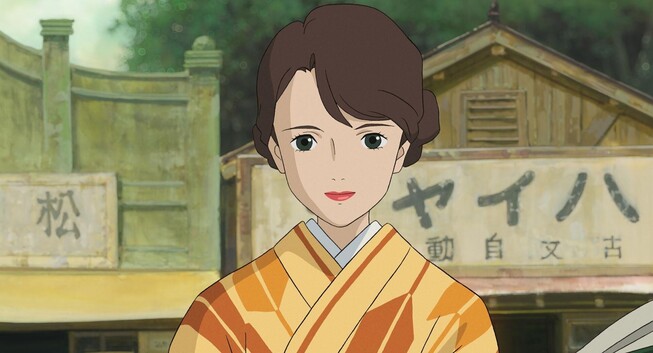 Natsuko, standing in front of old shop